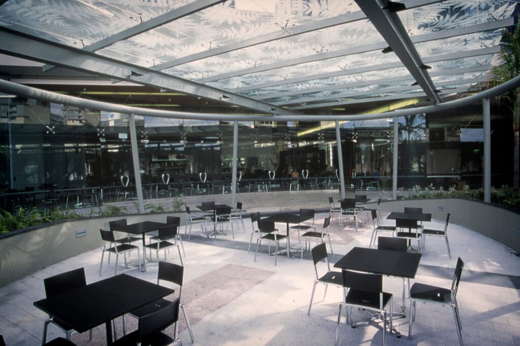 Café area with dappled fern leaf glass skylight at Vero corporate offices